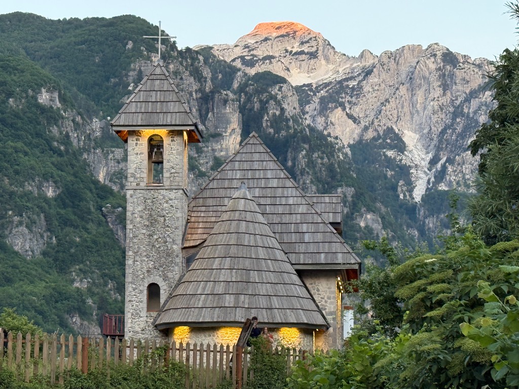 Stone church in the Albanian Alps at sunset